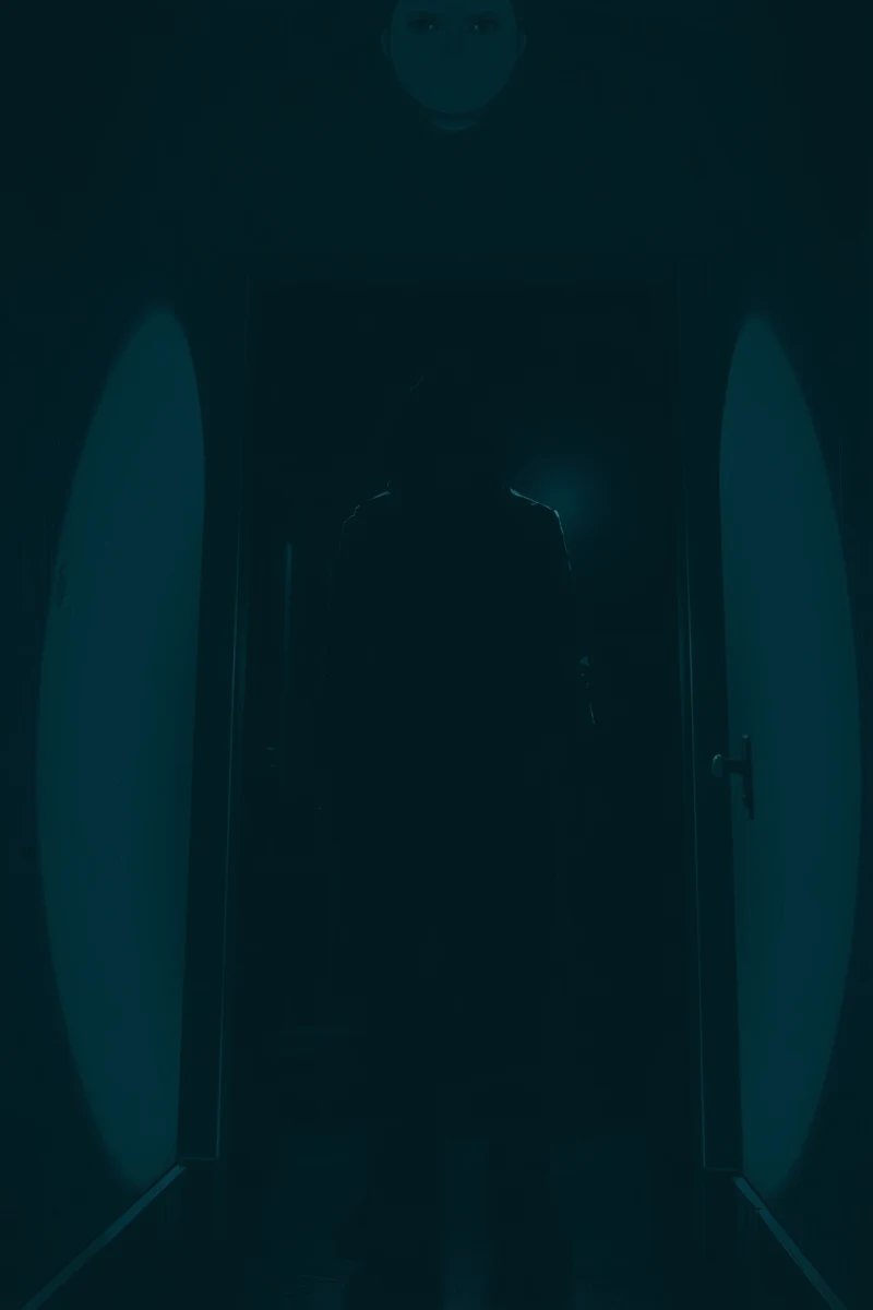 Dream of a Faceless Intruder Standing in the Hallway